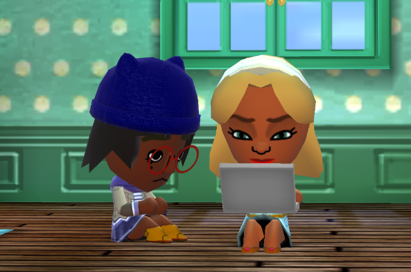 Jill using a laptop while Lottie watches