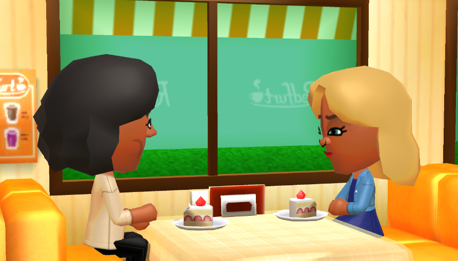 Mona and Jill talking at the cafe